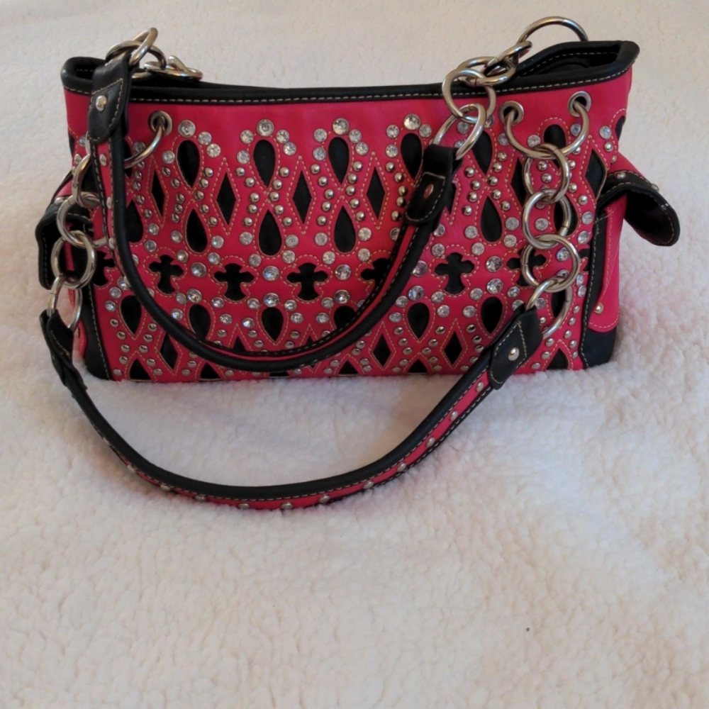 Studded leather purse with a matching wallet